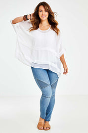 Model Laura wearing size 14 of the You See Through Me Blouse in colour White (White), from the front, showing the whole outfit