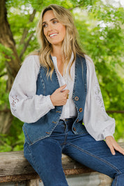 Model Tegan wearing size 10 of the Fine and Dandy Denim Vest in colour Darkdenim (Blue), from the front, showing the whole outfit