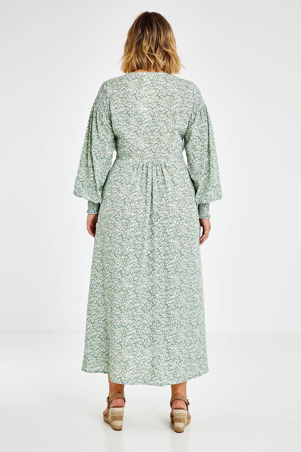 Model Jess wearing size 14 of the Field Of Dreams Button Up Dress in colour Greenfleur (Green), from the back