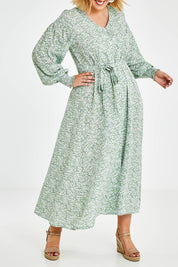 Model Jess wearing size 14 of the Field Of Dreams Button Up Dress in colour Greenfleur (Green), from the front, cropped image