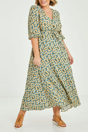 Model Fiona wearing size 16 of the Daisy Chain Swing Dress in colour Daisy (Blue), from the front, cropped image