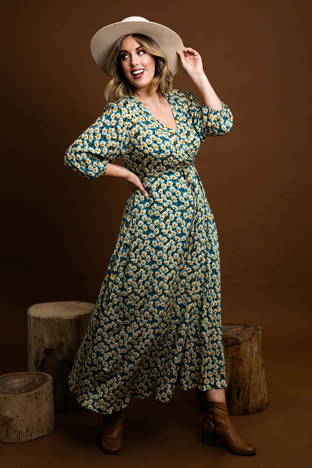 Model Jess wearing size 14 of the Daisy Chain Swing Dress in colour Daisy (Blue), from the front, showing the whole outfit
