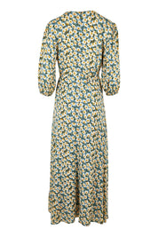 Product shot of the Daisy Chain Swing Dress in colour Daisy (Blue), from the back