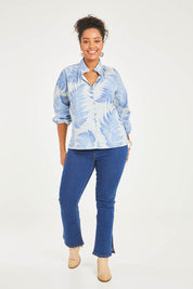 Model Noli wearing size 14 of the Fern Fair Cotton Blouse in colour Bluefern (Blue), from the front, showing the whole outfit