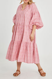 Model Keeara wearing size 16 of the Light Of The Sun Cotton Dress in colour Pinkfleur (Pink), from the front, cropped image