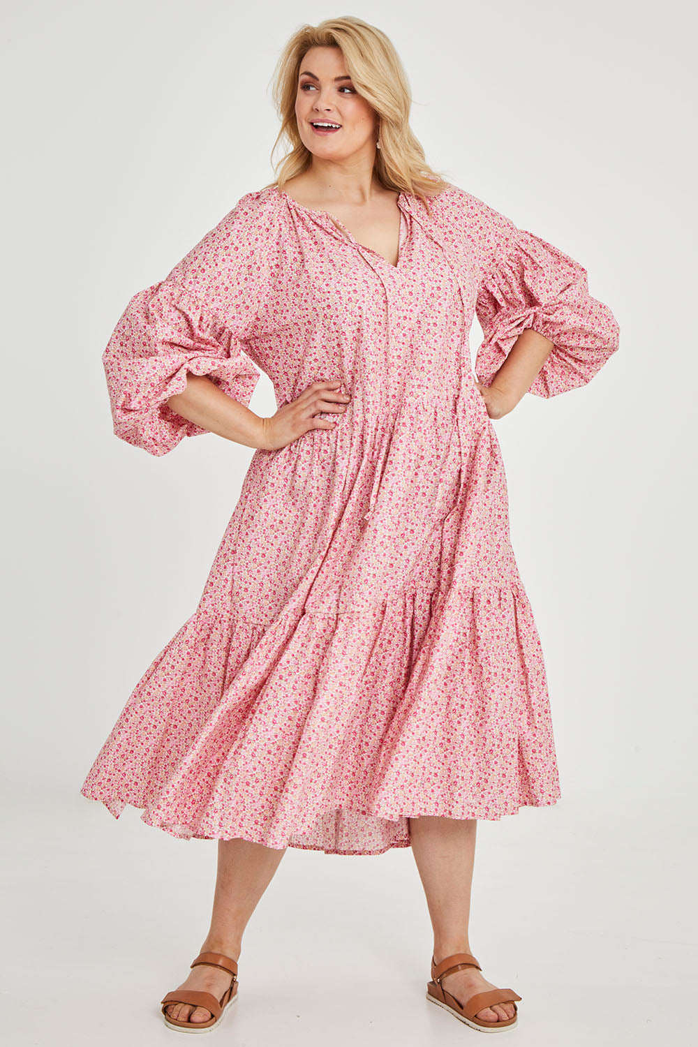 Model Keeara wearing size 16 of the Light Of The Sun Cotton Dress in colour Pinkfleur (Pink), from the front, showing the whole outfit