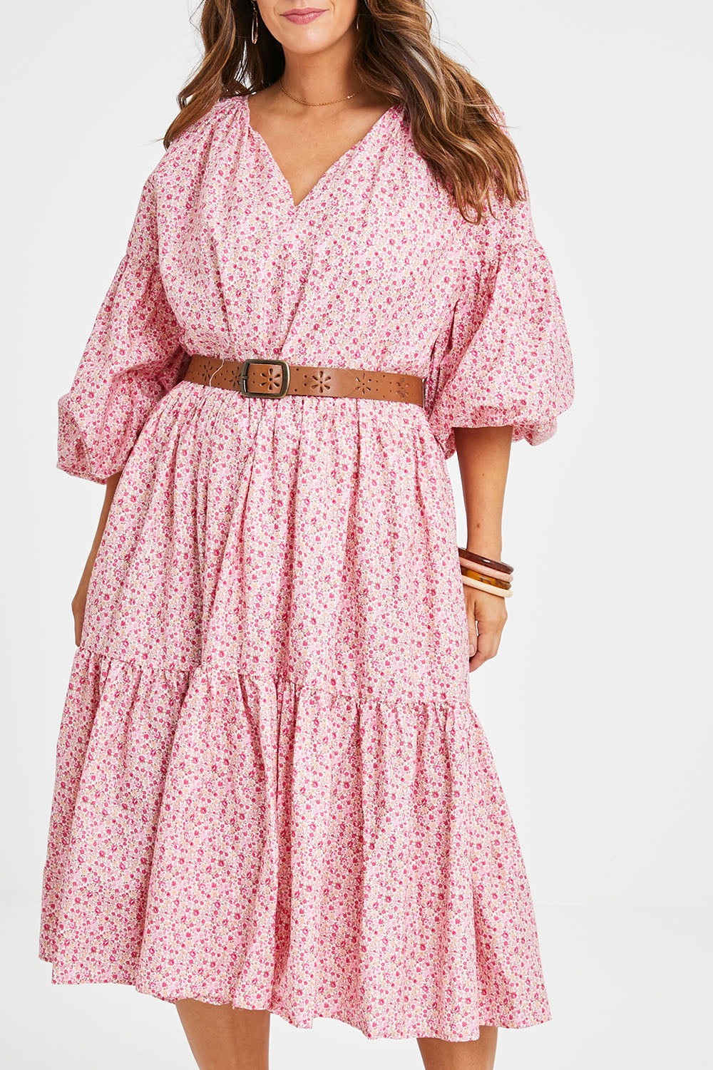 Model Laura wearing size 14 of the Light Of The Sun Cotton Dress in colour Pinkfleur (Pink), from the front, cropped image