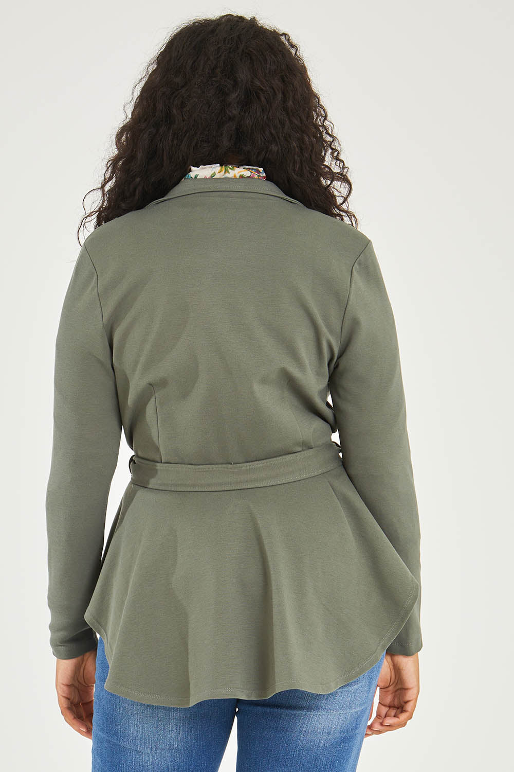 Model Noli wearing size 14 of the Femme Fatale Ponte Jacket in colour Moss (Green), from the back