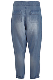 Product shot of the With My Tribe Pants in colour Denim (Blue), from the back