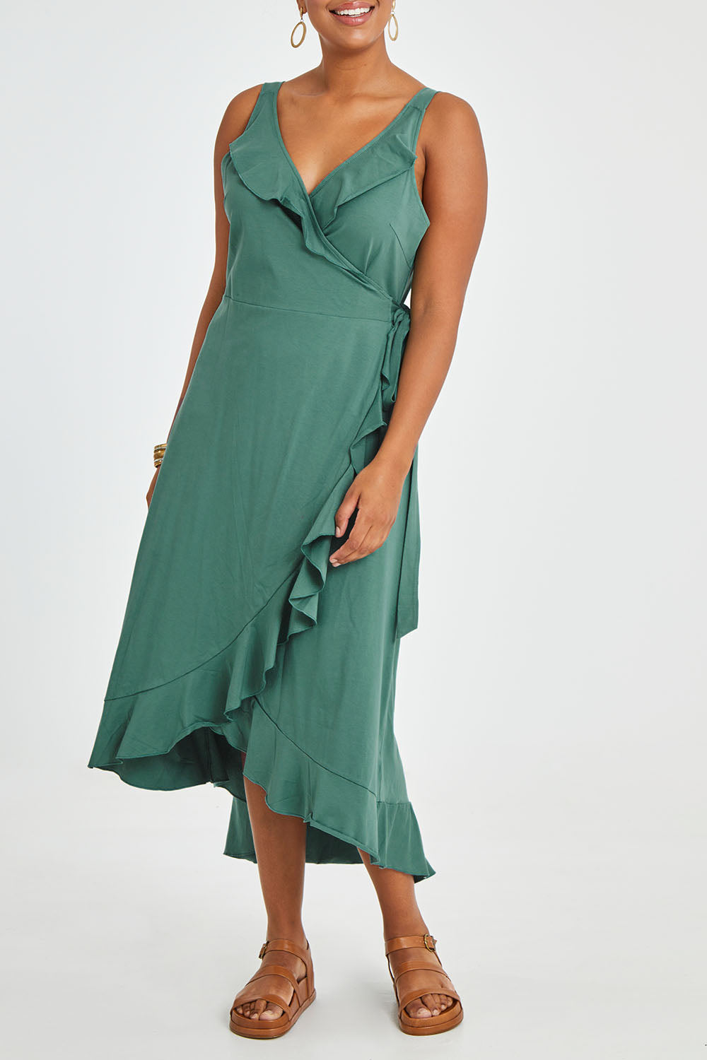 Model Noli wearing size 14 of the Preloved Thats A Wrap Mercerised Cotton Dress in colour Fern (Green), from the front, cropped image