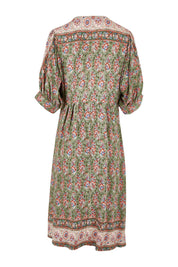 Product shot of the Sunshine And Flowers Smock Dress in colour Sagefleur (Green), from the back