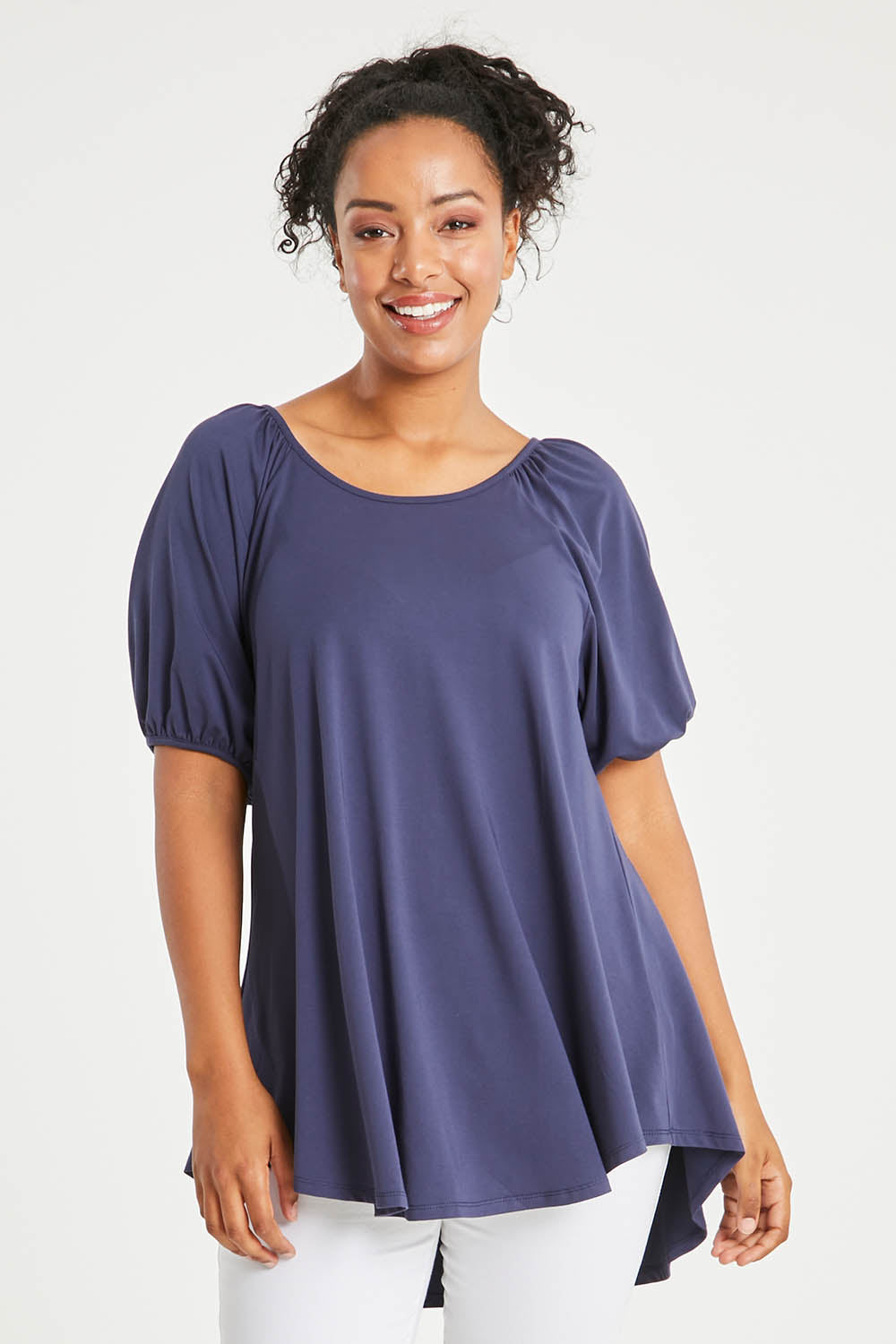 Model Noli wearing size 14 of the Sweet Melody Bamboo Tee in colour Navy (Blue), from the front, cropped image