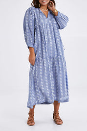 Model Monique wearing size 14 of the Puff Sleeve Delight Dress in colour Bluewhite (Blue), from the front, cropped image
