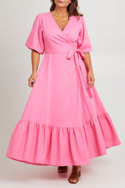 Model Monique wearing size 14 of the La Dolce Vita Puff Sleeve Dress in colour Bubblegum (Pink), from the front, cropped image