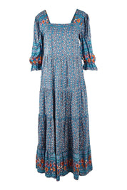 Product shot of the Paradise Found Maxi Dress in colour Denimfleur (Blue), from the front