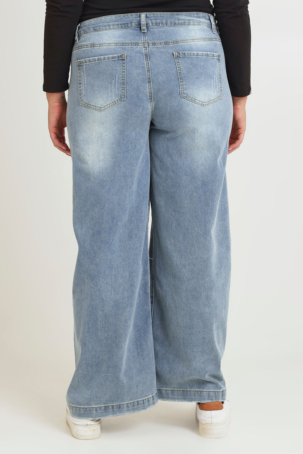 Model Chanel wearing size 16 of the Always There For Me Boyfriend Jeans in colour Denim (Blue), from the back