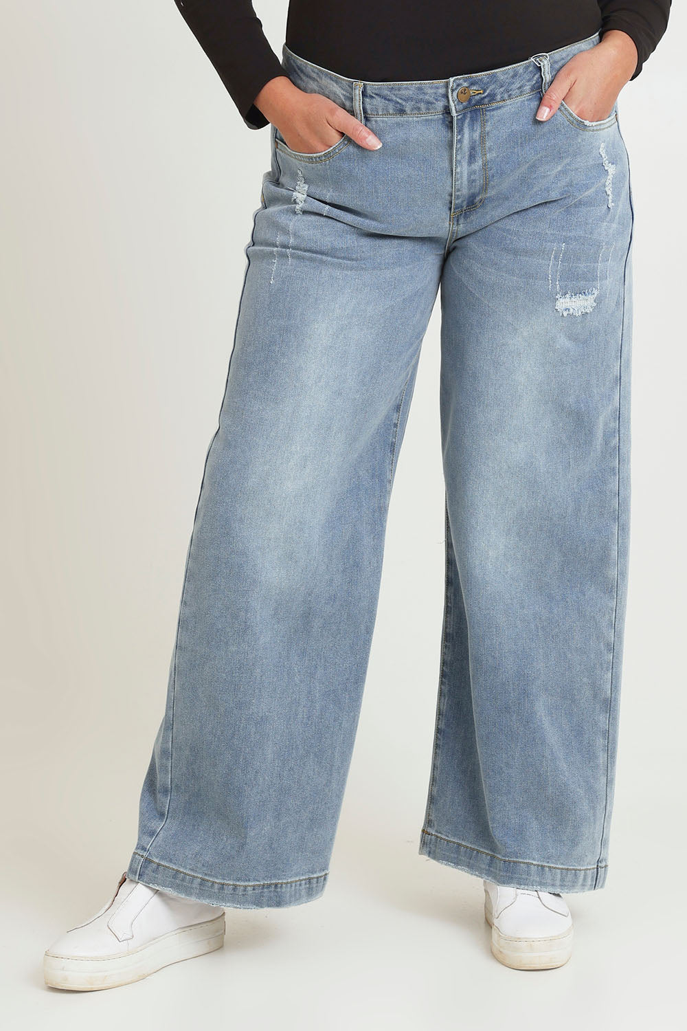Model Chanel wearing size 16 of the Always There For Me Boyfriend Jeans in colour Denim (Blue), from the front, cropped image