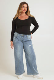Model Chanel wearing size 16 of the Always There For Me Boyfriend Jeans in colour Denim (Blue), from the front, showing the whole outfit