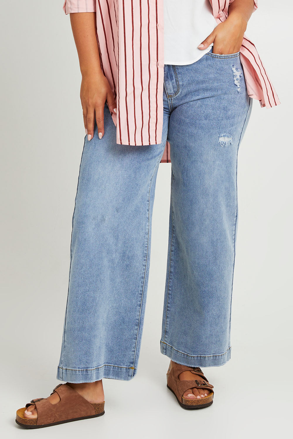 Model Monique wearing size 14 of the Always There For Me Boyfriend Jeans in colour Denim (Blue), from the front, cropped image