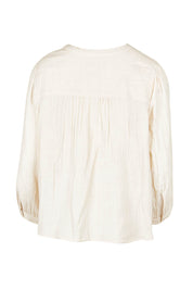 Product shot of the First Light Cotton Blouse in colour Milk (White), from the back