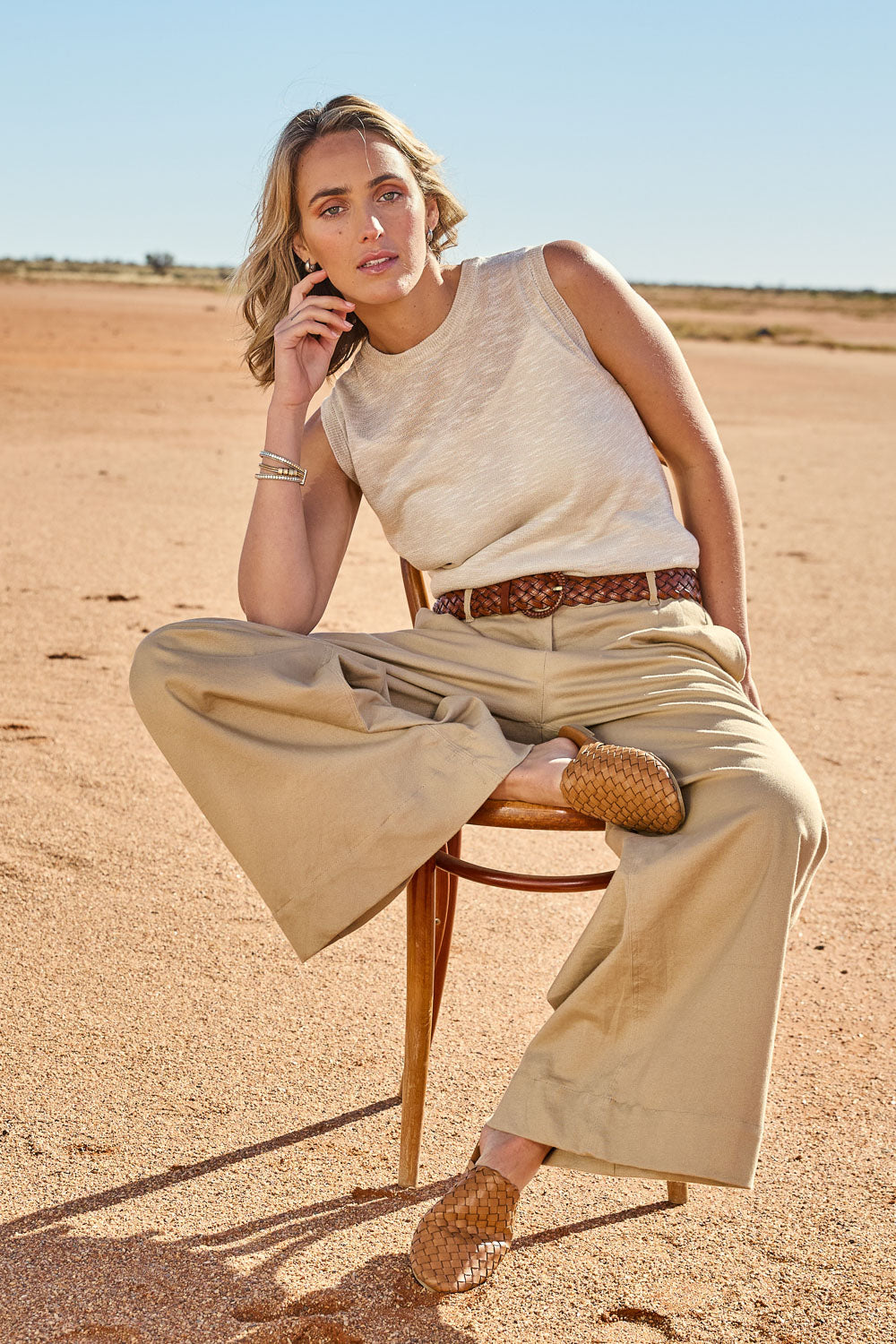 Model Tegan wearing size S of the Go To Knit Crew Tank in colour Natural, from the front, showing the whole outfit