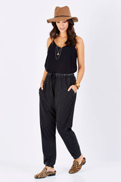 Model Georgia wearing size 10 of the Hunt And Gather Pants in colour Black (Black), from the front, showing the whole outfit