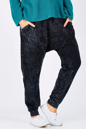 Model Laura wearing size 12 of the Hunt And Gather Pants in colour Black (Black), from the front, cropped image