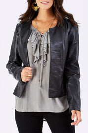 Model Georgia wearing size 10 of the Forever Leather Jacket in colour Black (Black), from the front, cropped image