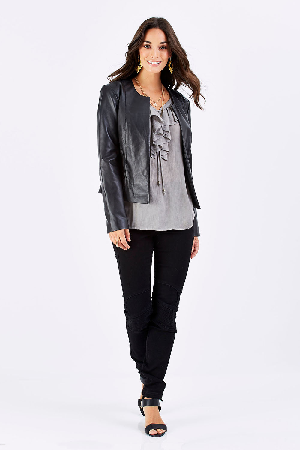 Model Georgia wearing size 10 of the Forever Leather Jacket in colour Black (Black), from the front, showing the whole outfit