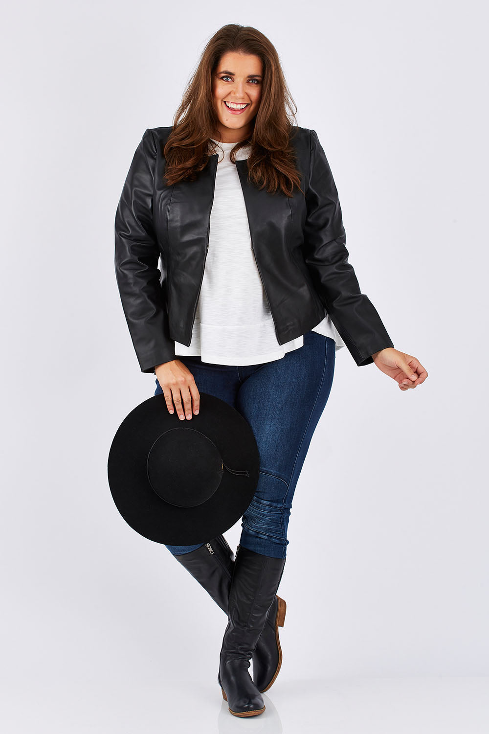 Model Mae wearing size 18 of the Forever Leather Jacket in colour Black (Black), from the front, showing the whole outfit