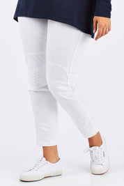 Model Mae wearing size 18 of the Wild West Stitched Jeggings in colour White (White), from the front, cropped image