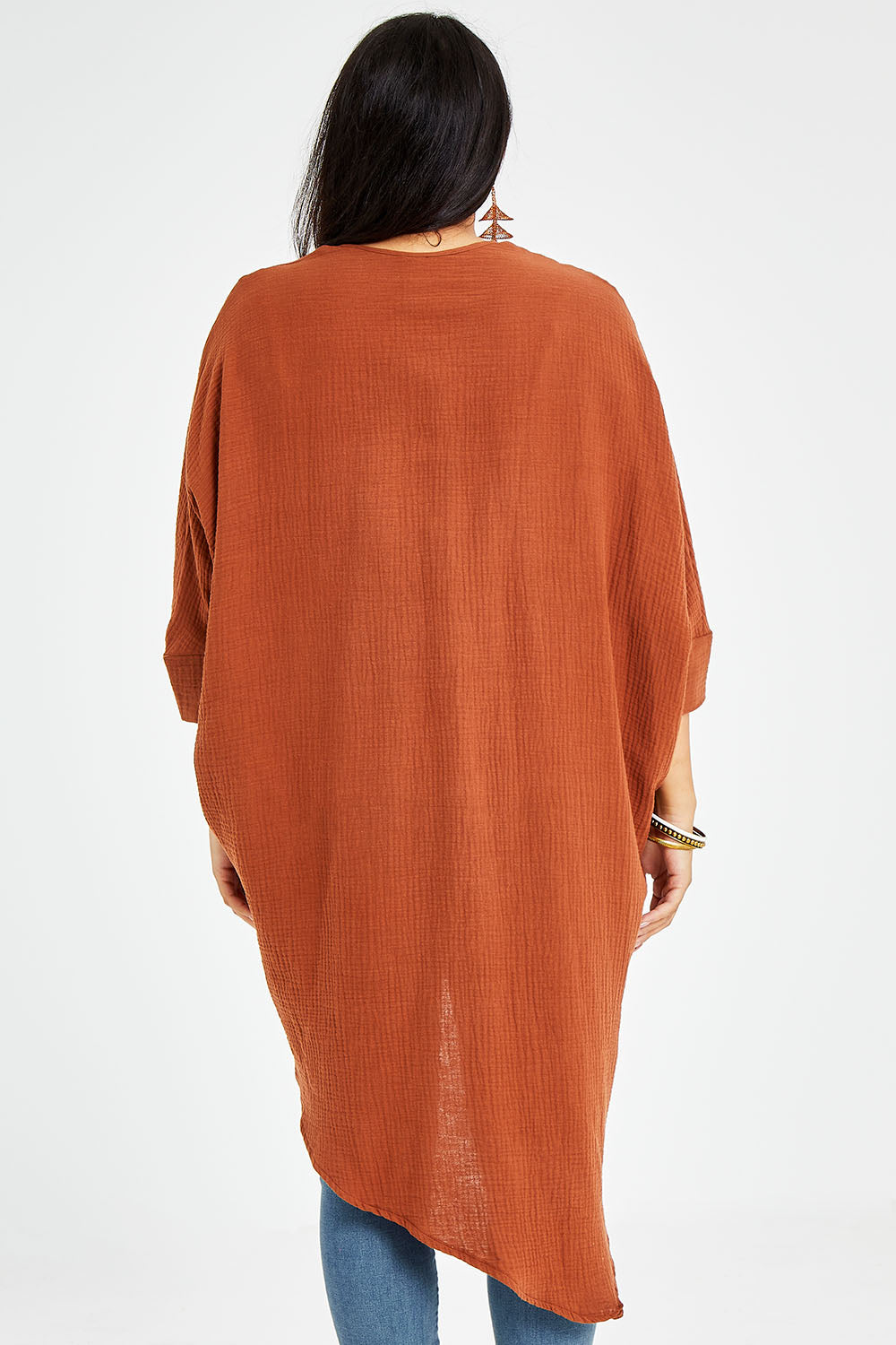 Model Sasha-Lee wearing size 16 of the Falling For You Cotton Cardi in colour Cinnamon, from the back