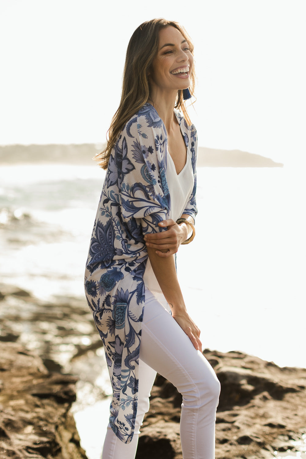 Model Amanda wearing size 10 of the Falling For You Cardi in colour Bluewhite (Blue), from the front, showing the whole outfit