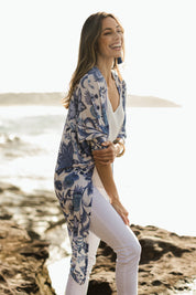 Model Amanda wearing size 10 of the Falling For You Cardi in colour Bluewhite (Blue), from the front, showing the whole outfit