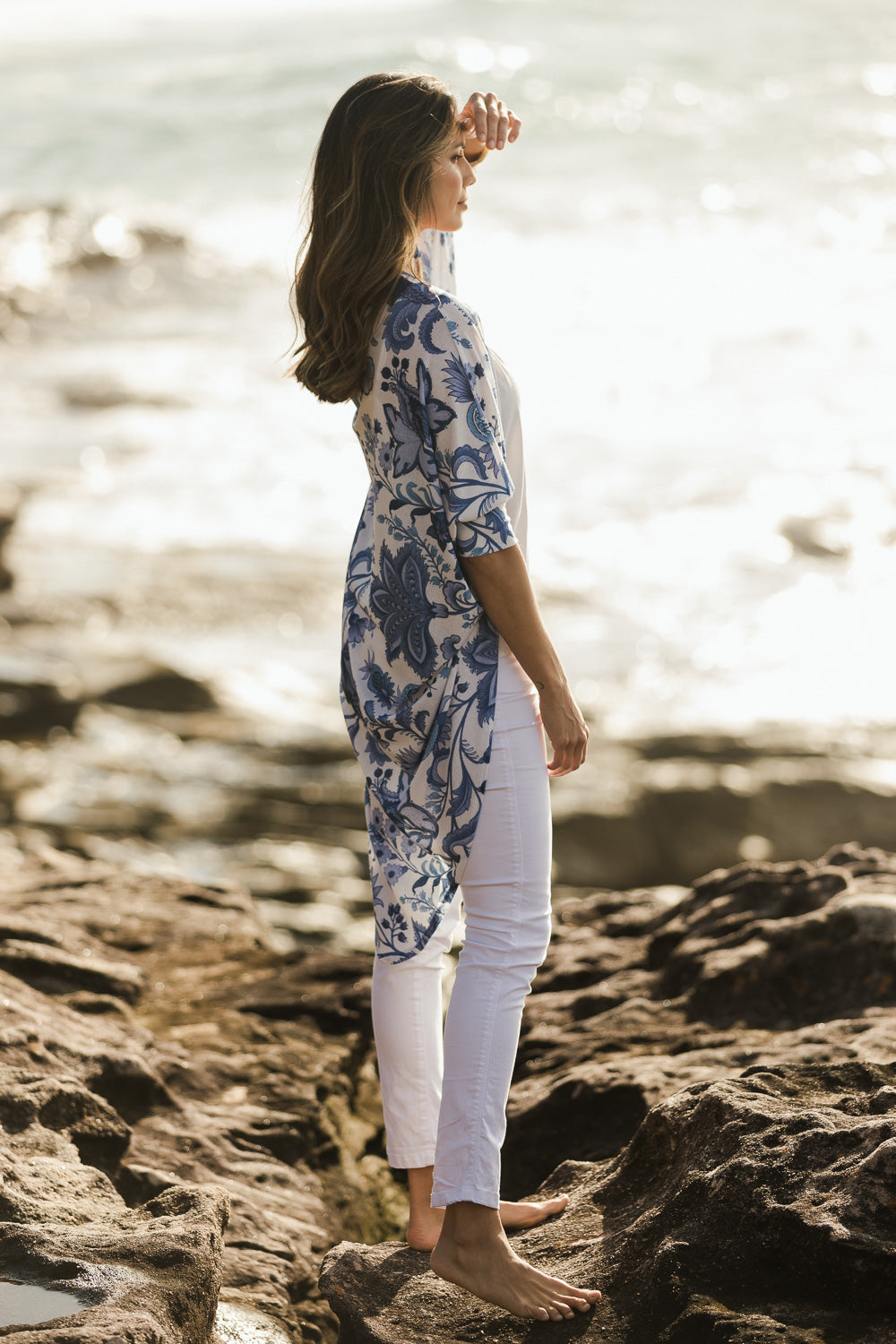 Model Amanda wearing size 10 of the Falling For You Cardi in colour Bluewhite (Blue), from the front, showing the whole outfit