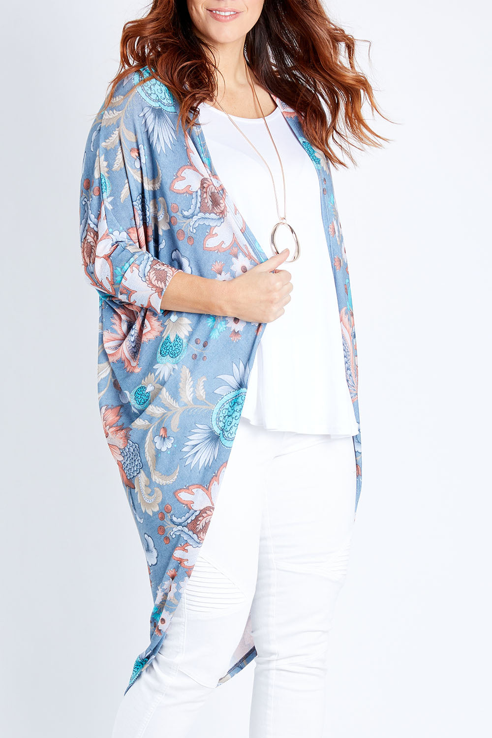 Model Laura wearing size 14 of the Falling For You Cardi in colour Denim (Blue), from the front, cropped image