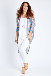 Model Laura wearing size 14 of the Falling For You Cardi in colour Denim (Blue), from the front, showing the whole outfit