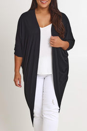 Model Ashleigh wearing size 16 of the Falling For You Cardi in colour Black (Black), from the front, cropped image