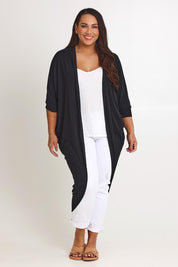 Model Ashleigh wearing size 16 of the Falling For You Cardi in colour Black (Black), from the front, showing the whole outfit