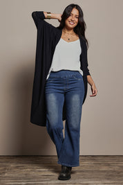 Model Tahnee wearing size 10 of the Falling For You Cardi in colour Black (Black), from the front, showing the whole outfit