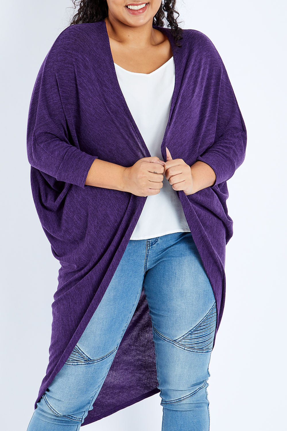 Model Sasha-Lee wearing size 16 of the Falling For You Cardi in colour Grape (Purple), from the front, cropped image