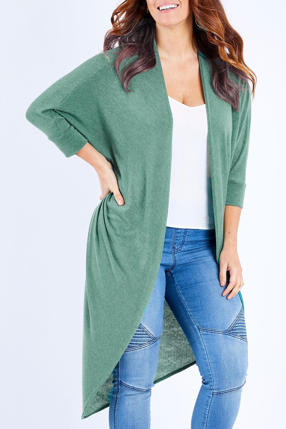 Model Laura wearing size 14 of the Falling For You Cardi in colour Myrtle (Green), from the front, cropped image