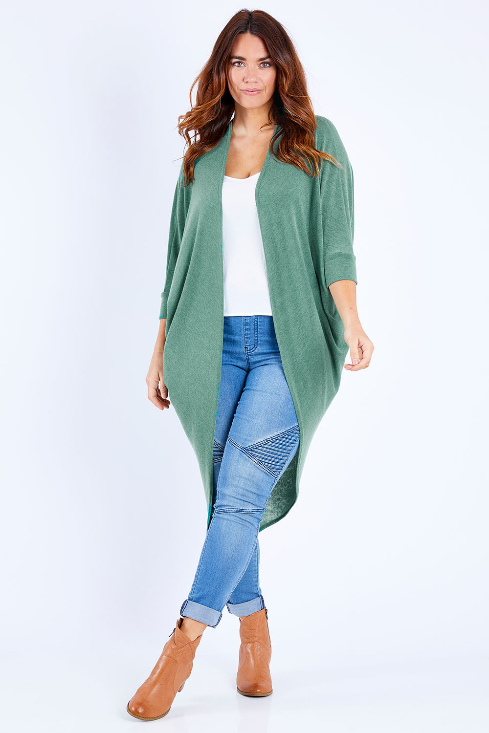 Model Laura wearing size 14 of the Falling For You Cardi in colour Myrtle (Green), from the front, showing the whole outfit