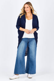 Model Jess wearing size 14 of the Falling For You Cardi in colour Navy (Blue), from the front, showing the whole outfit