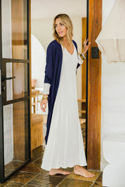 Model Tegan wearing size 10 of the Falling For You Cardi in colour Navy (Blue), from the front, showing the whole outfit