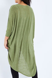 Model Sasha-Lee wearing size 16 of the Falling For You Cardi in colour Olive (Green), from the back