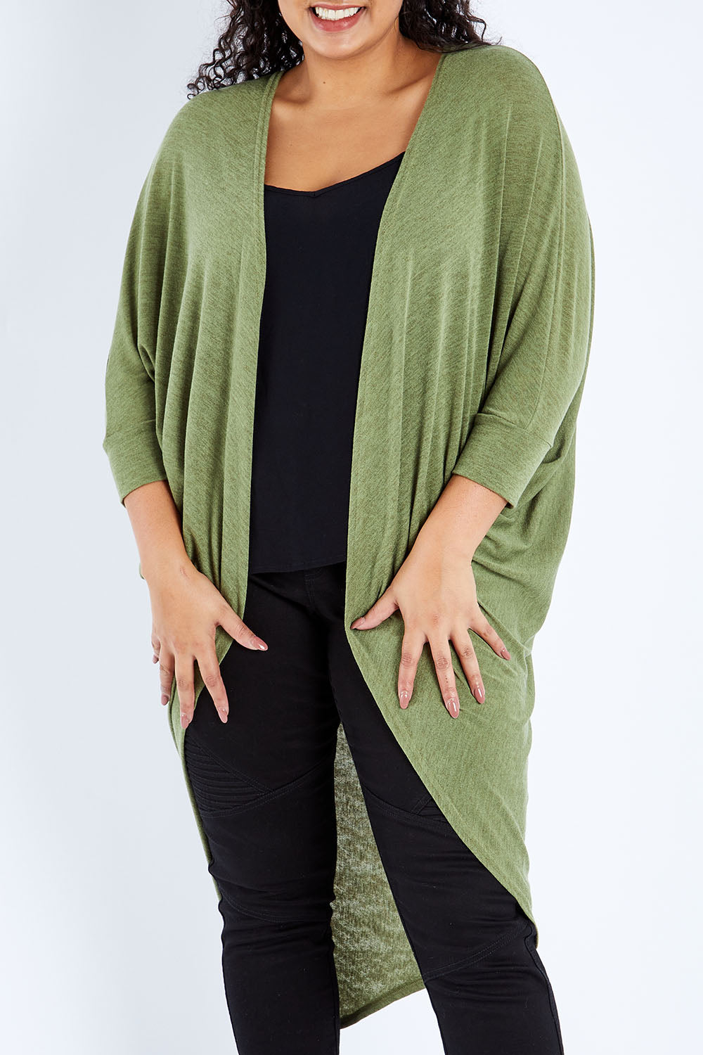 Model Sasha-Lee wearing size 16 of the Falling For You Cardi in colour Olive (Green), from the front, cropped image