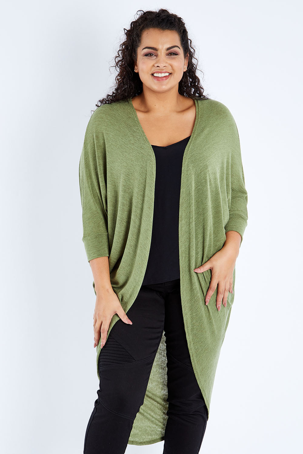 Model Sasha-Lee wearing size 16 of the Falling For You Cardi in colour Olive (Green), from the front, cropped image
