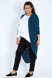Model Sasha-Lee wearing size 16 of the Falling For You Cardi in colour Petrol (Blue), from the front, showing the whole outfit