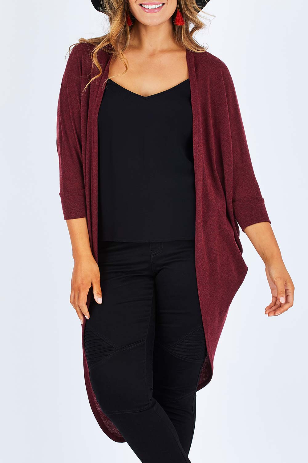 Model Palatina wearing size 14 of the Falling For You Cardi in colour Port (Purple), from the front, cropped image